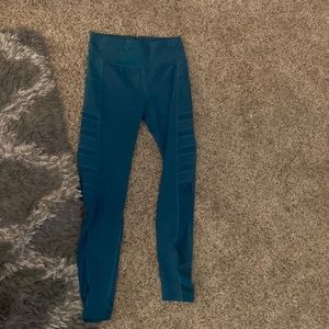 leggings, teal, mesh pieces on the sides